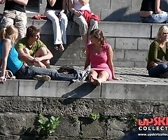 Busty chick voyeured in public. Up skirt sitting